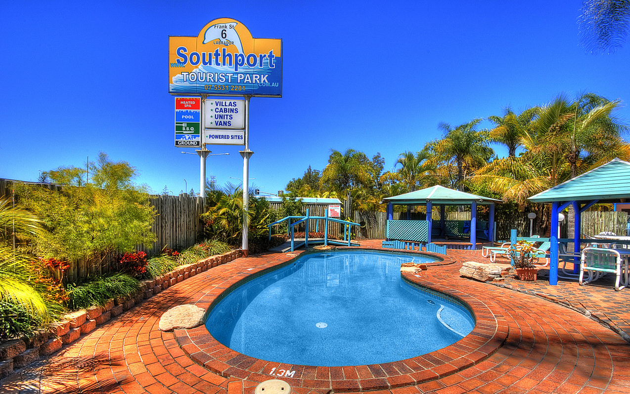 Sparkling Resort Pool & Welcome Sign